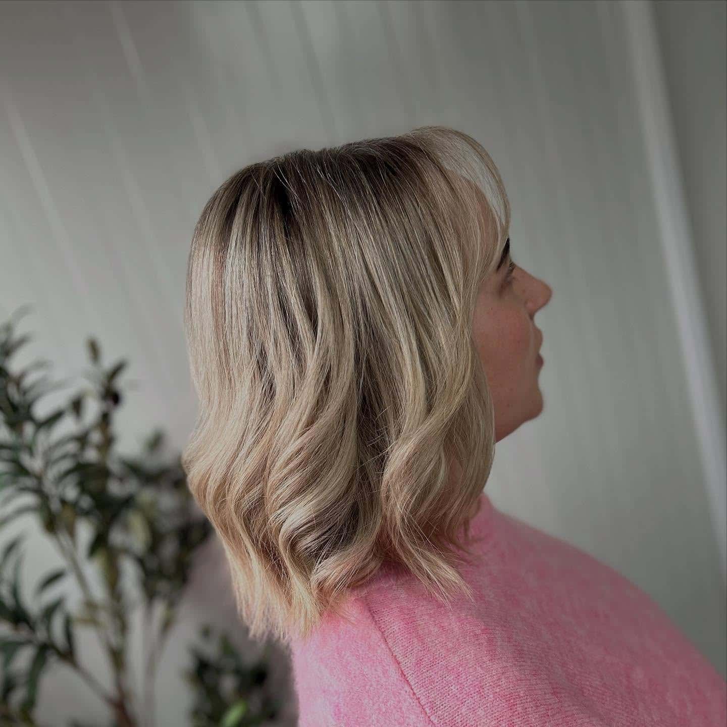 12. Soft Rooted Blonde Wavy Lob - Short Blonde Hairstyles