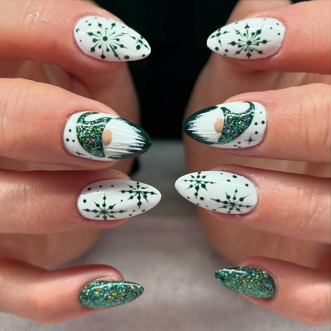 6. Forest Green Glitter and Snowflake Art - green and white nail ideas