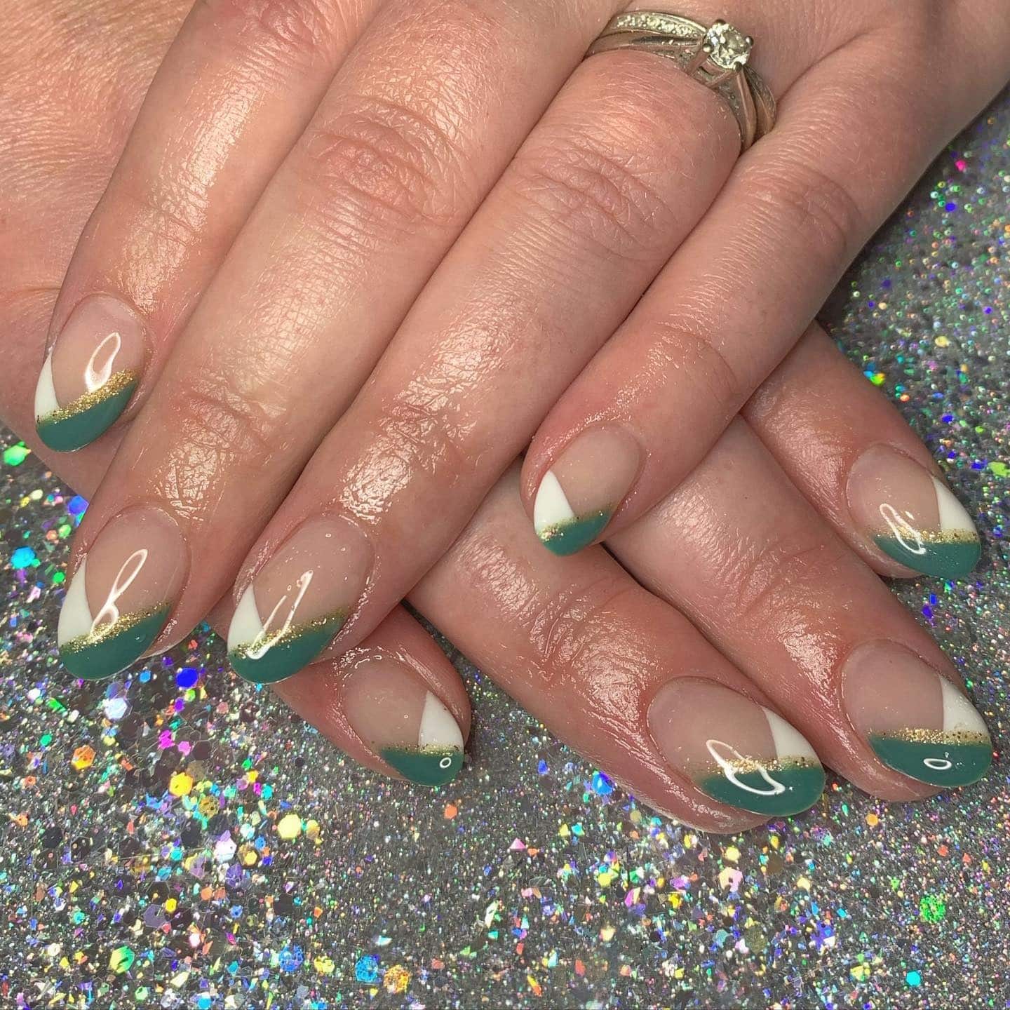 11. Green French Tips with Gold Dust Detail - green and white nail ideas