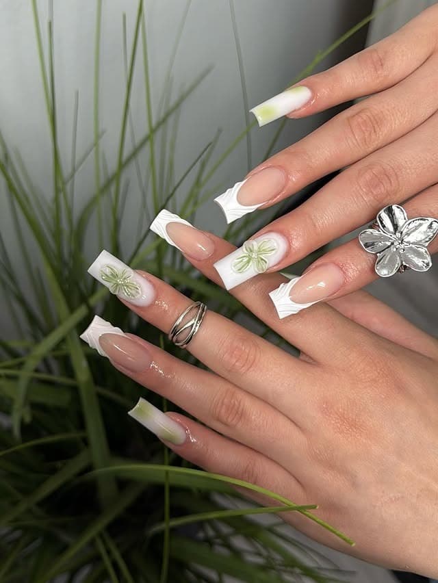 19. White Floral Square Nails with Soft Green Accents - green and white nail ideas