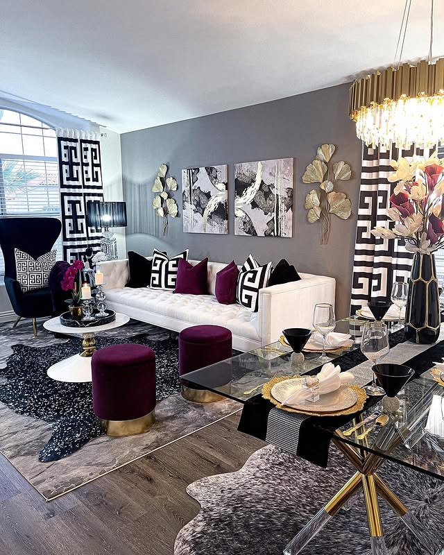 4. Black and Gold Glam with Graphic Contrast - glam living room ideas