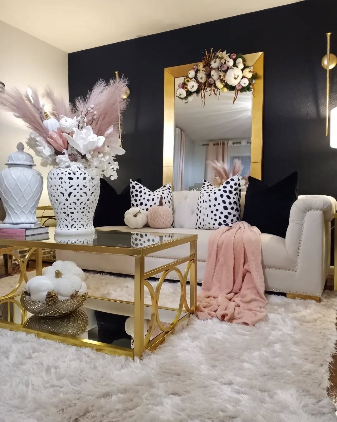 9. Dramatic Glam with Black Walls and Gold Details - glam living room ideas