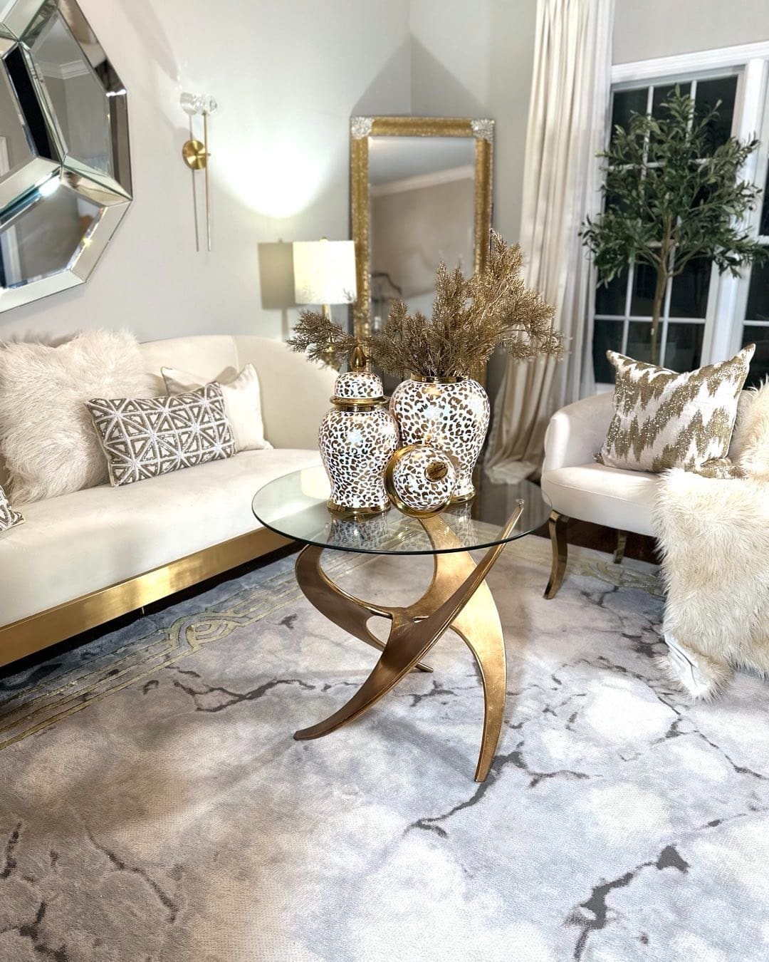 11. Modern Glam Ivory and Gold Statement Living Room - glam living room ideas