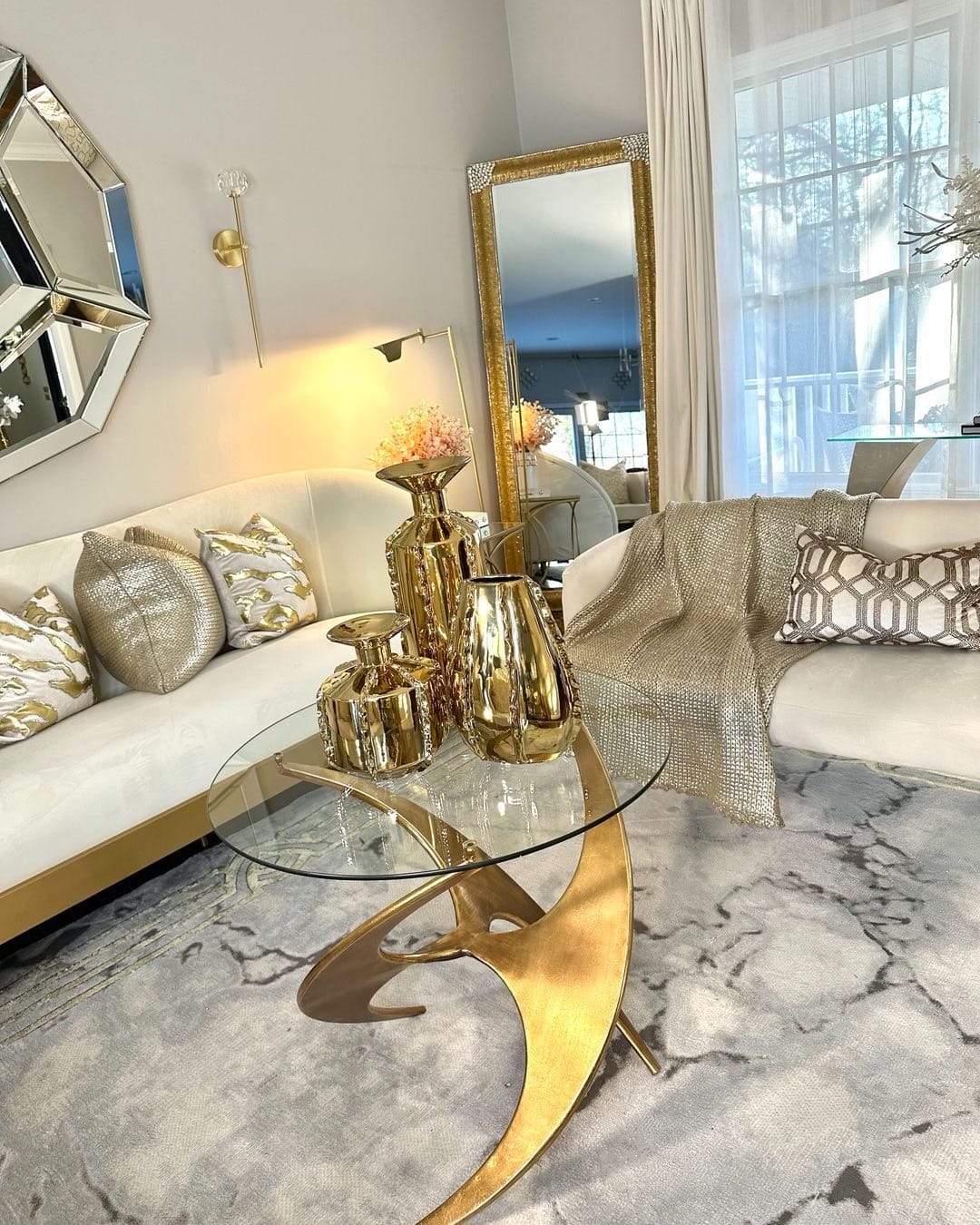 12. Soft Glam Neutrals with Layered Metallic Decor - glam living room ideas