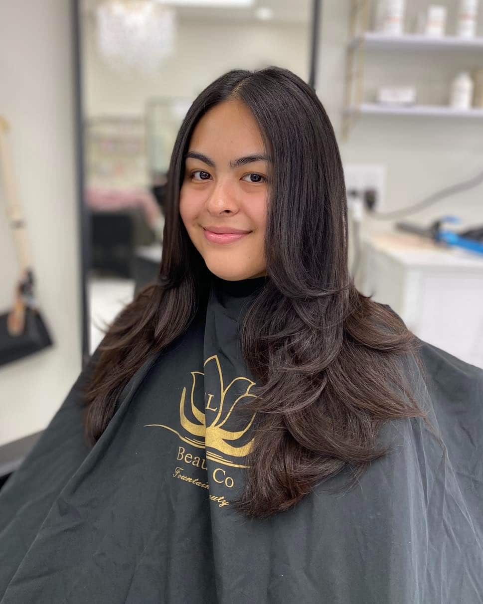 3. Deep Espresso Long Layers with Smooth Finish - Long Layered Hairstyles
