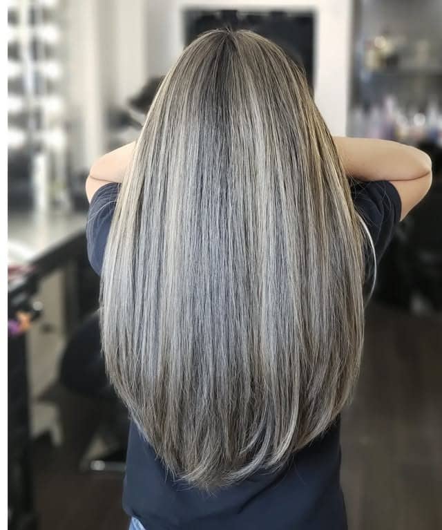 5. Cool Ash Blonde Long Layers with Blended Lengths - Long Layered Hairstyles