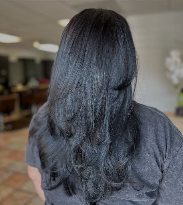 11. Smoky Black Long Layers with Feathered Ends - Long Layered Hairstyles