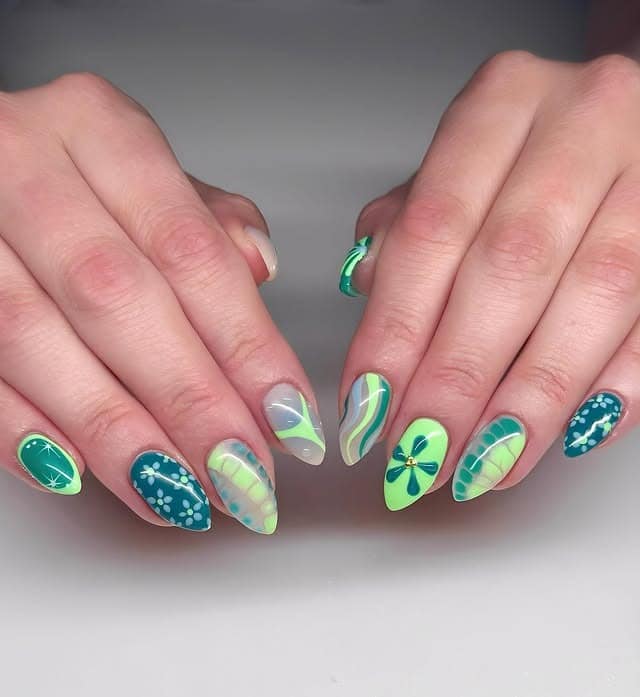 10. Green Graphic Almond Nails with Mixed Patterns - groovy nail ideas