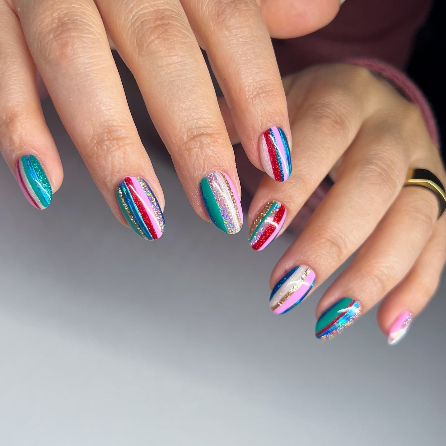 16. Glitter Stripe Almond Nails in Teal and Magenta - groovy nail ideas