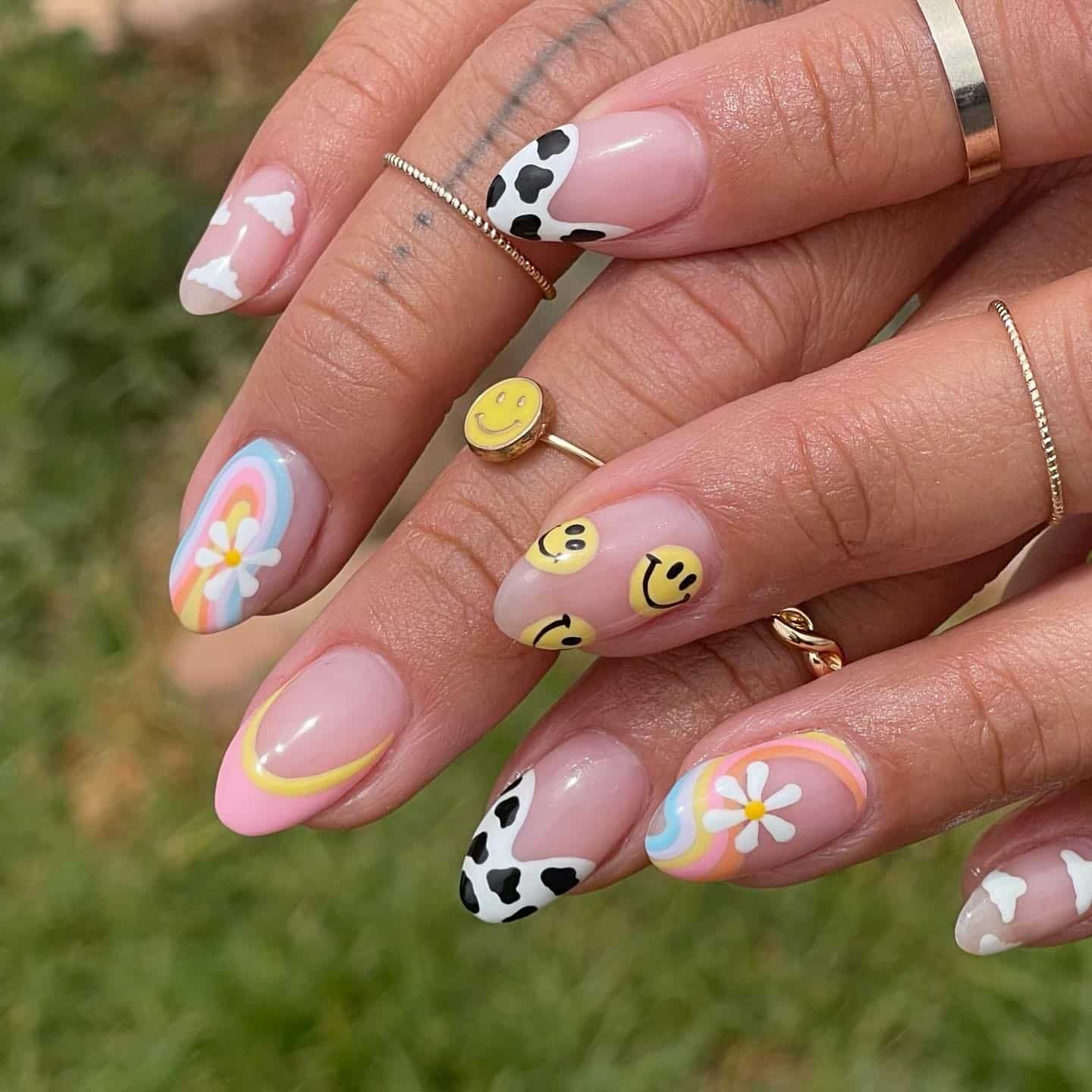 22. Playful Mixed Motif Almond Nails in Pastel and Black - groovy nail ideas