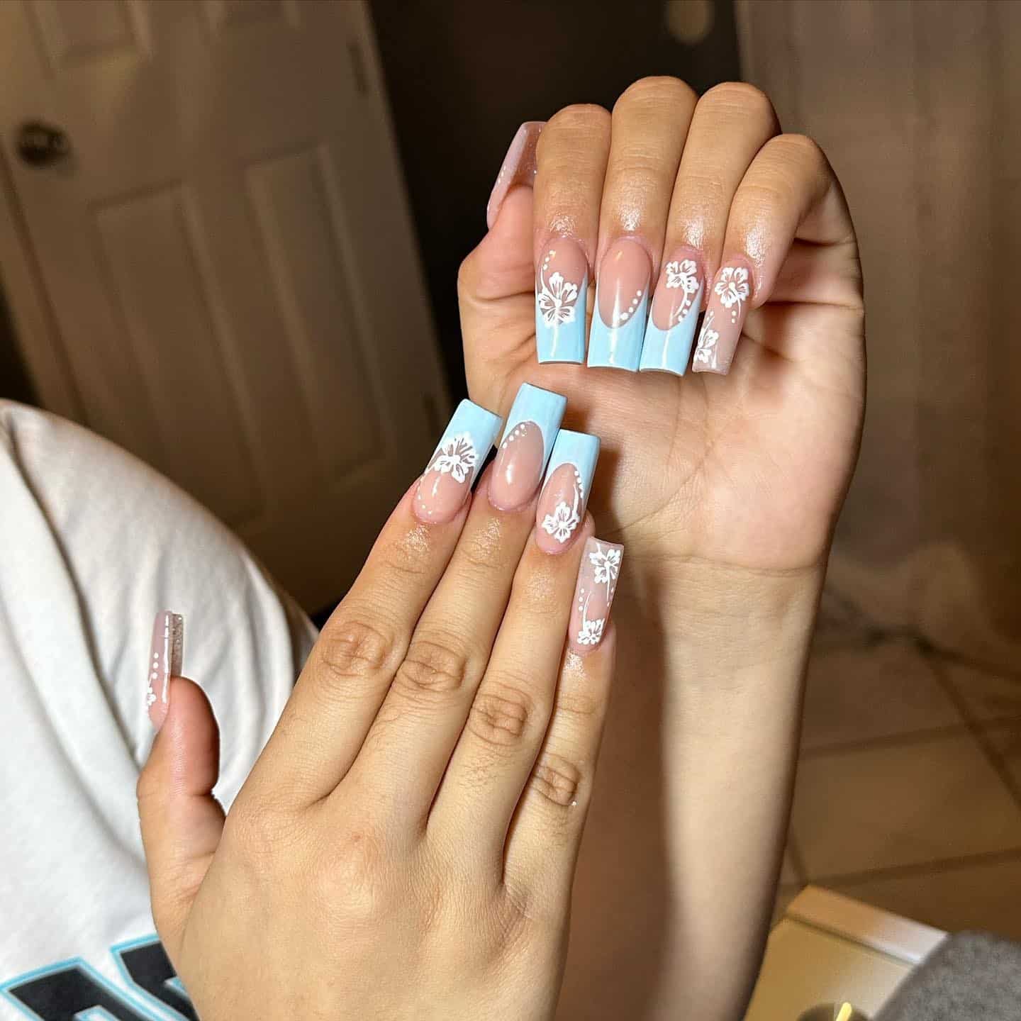 5. Sky Blue Island French Tips - hawaiian flower nail ideas
