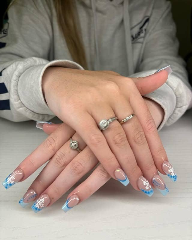 10. Icy Blue Floral French Coffins - hawaiian flower nail ideas