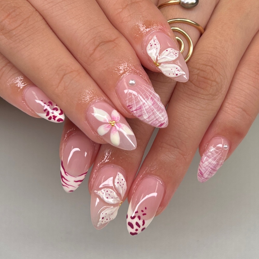 12. Soft Blush Orchid Almond Nails - hawaiian flower nail ideas