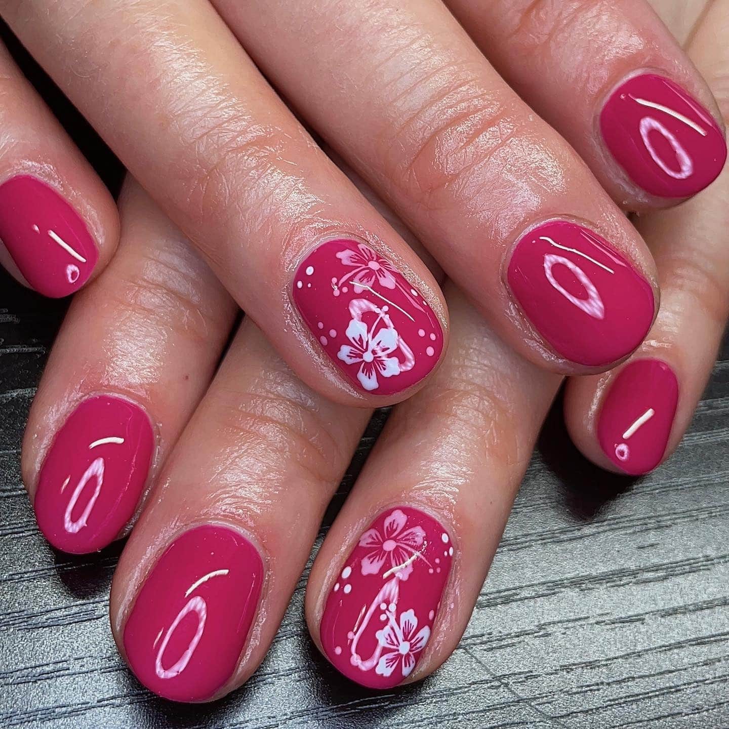 18. Magenta Hibiscus Short Nails - hawaiian flower nail ideas
