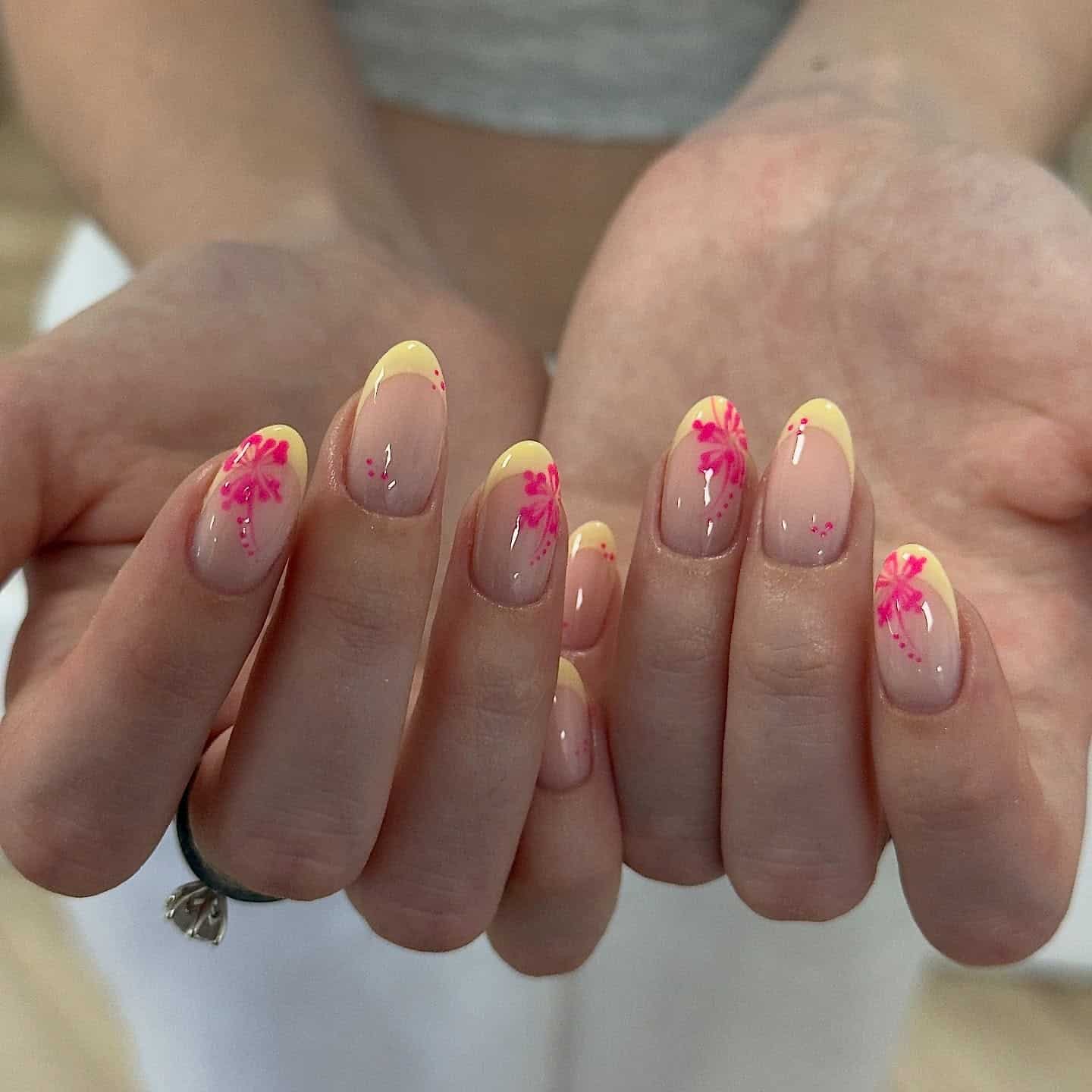 22. Soft Yellow Hibiscus Almond Nails - hawaiian flower nail ideas