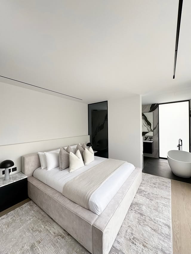 20. Minimalist Spa-Inspired Bedroom in Stone and Ivory - dream bedroom ideas