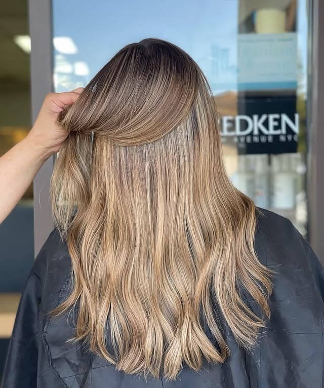 1. Soft Sand Blonde Balayage with Lived-In Layers - Blonde Balayage Hair Color