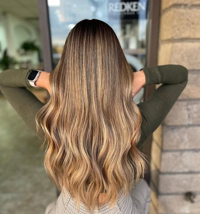 2. Golden Beige Balayage with Loose Waves - Blonde Balayage Hair Color