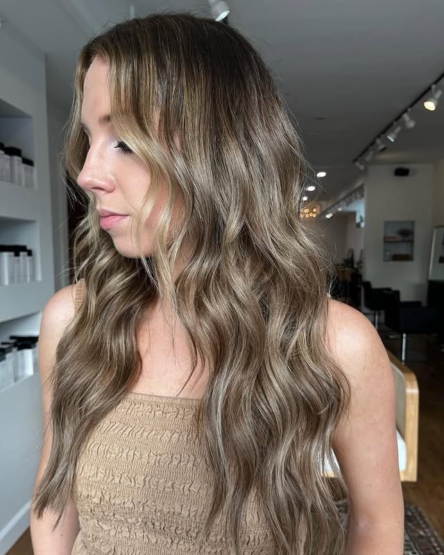 8. Warm Blonde Balayage with Natural Flow - Blonde Balayage Hair Color