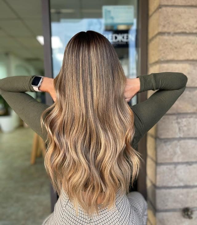 13. Neutral Blonde Balayage with Polished Waves - Blonde Balayage Hair Color