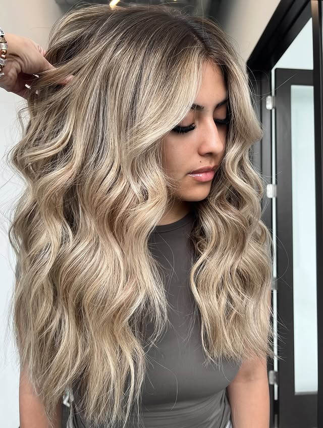 18. Creamy Blonde Balayage with Loose Defined Waves - Blonde Balayage Hair Color