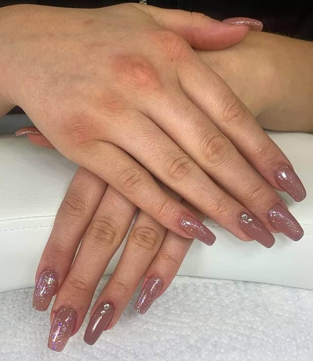 6. Shimmery Rose-Brown Almond Nails - light brown nail ideas