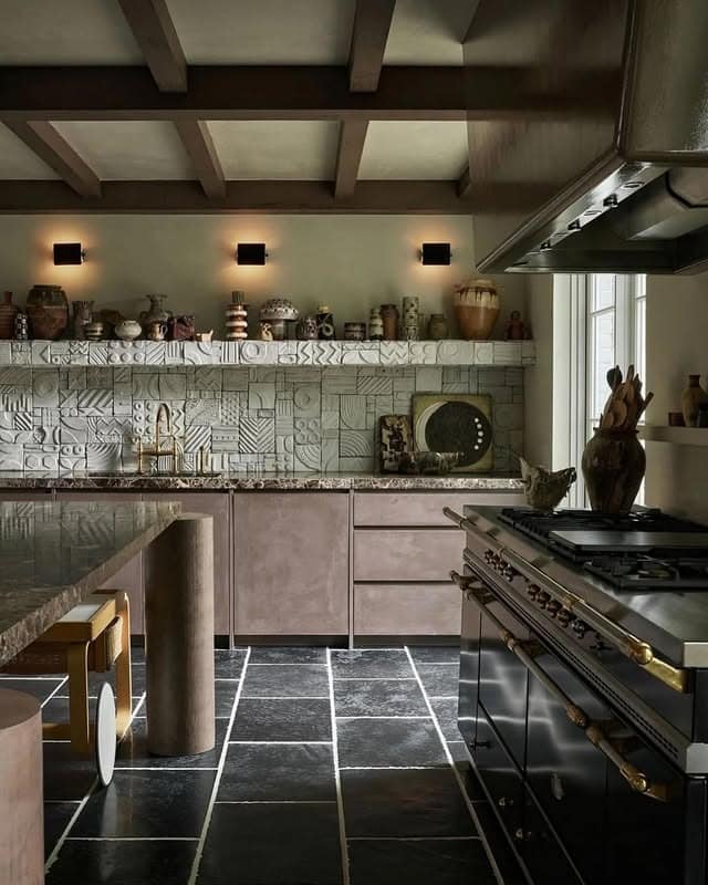 16. Textured Stone Kitchen with Earth-Toned Cabinetry - moody kitchen ideas