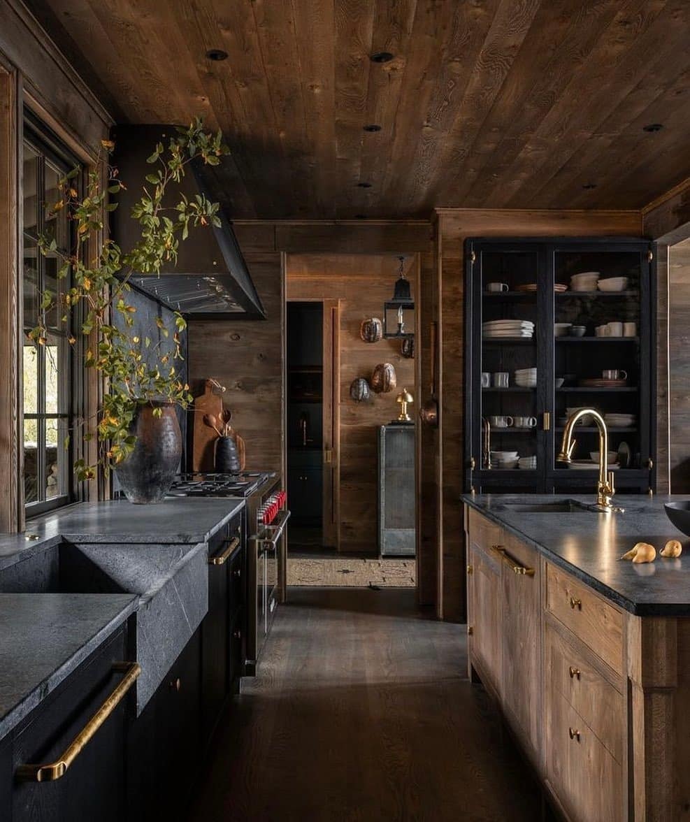 19. Rustic Dark Wood Kitchen with Black Stone Surfaces - moody kitchen ideas