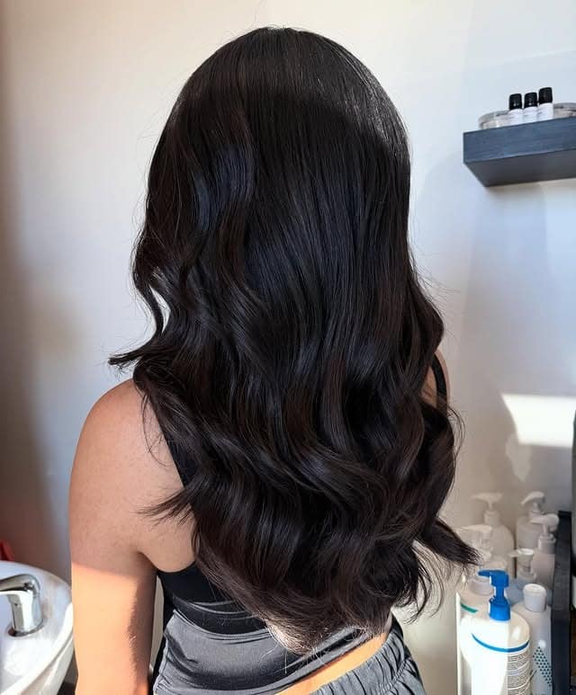 21. Soft Layered Waves in Natural Dark Brown - Dark Brown Hair Color