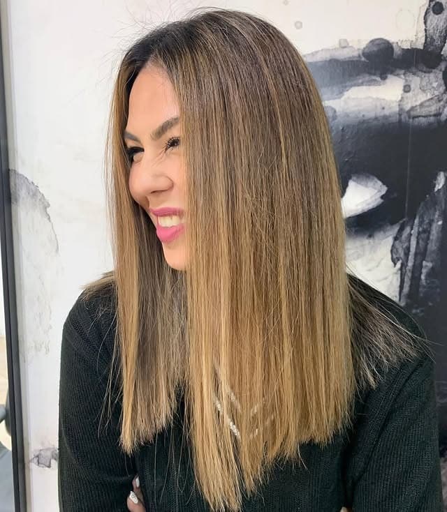 2. Sleek Caramel Melt Lob - Caramel Hair Color