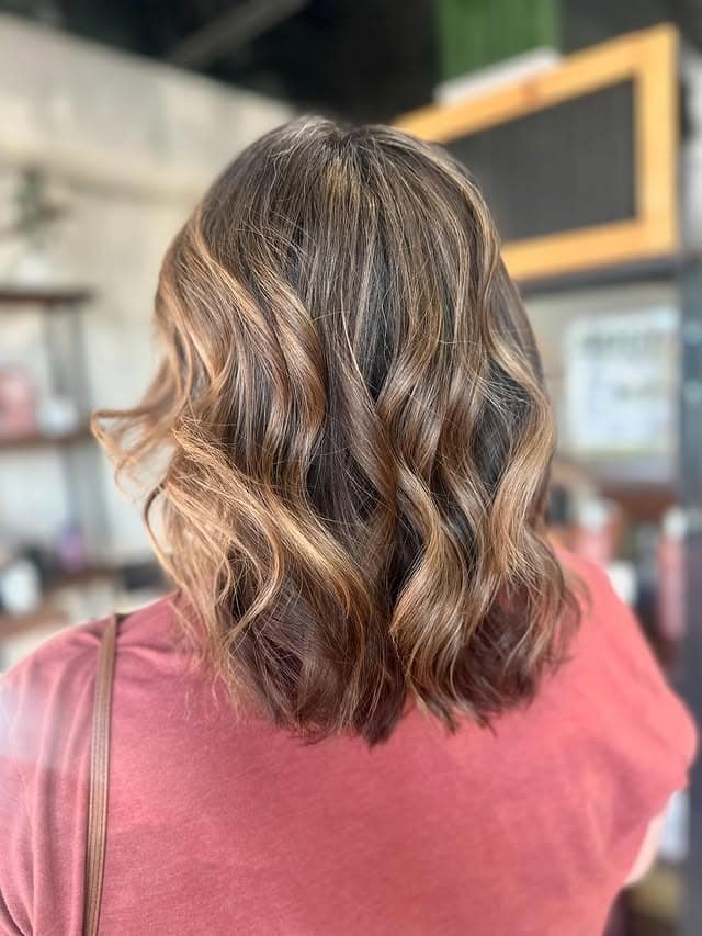 19. Caramel Highlighted Wavy Lob - Caramel Hair Color
