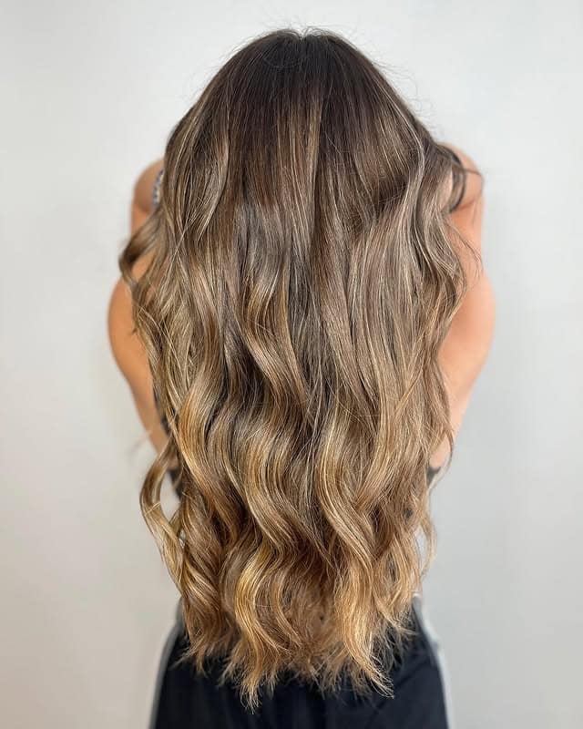 20. Dimensional Caramel Long Waves - Caramel Hair Color