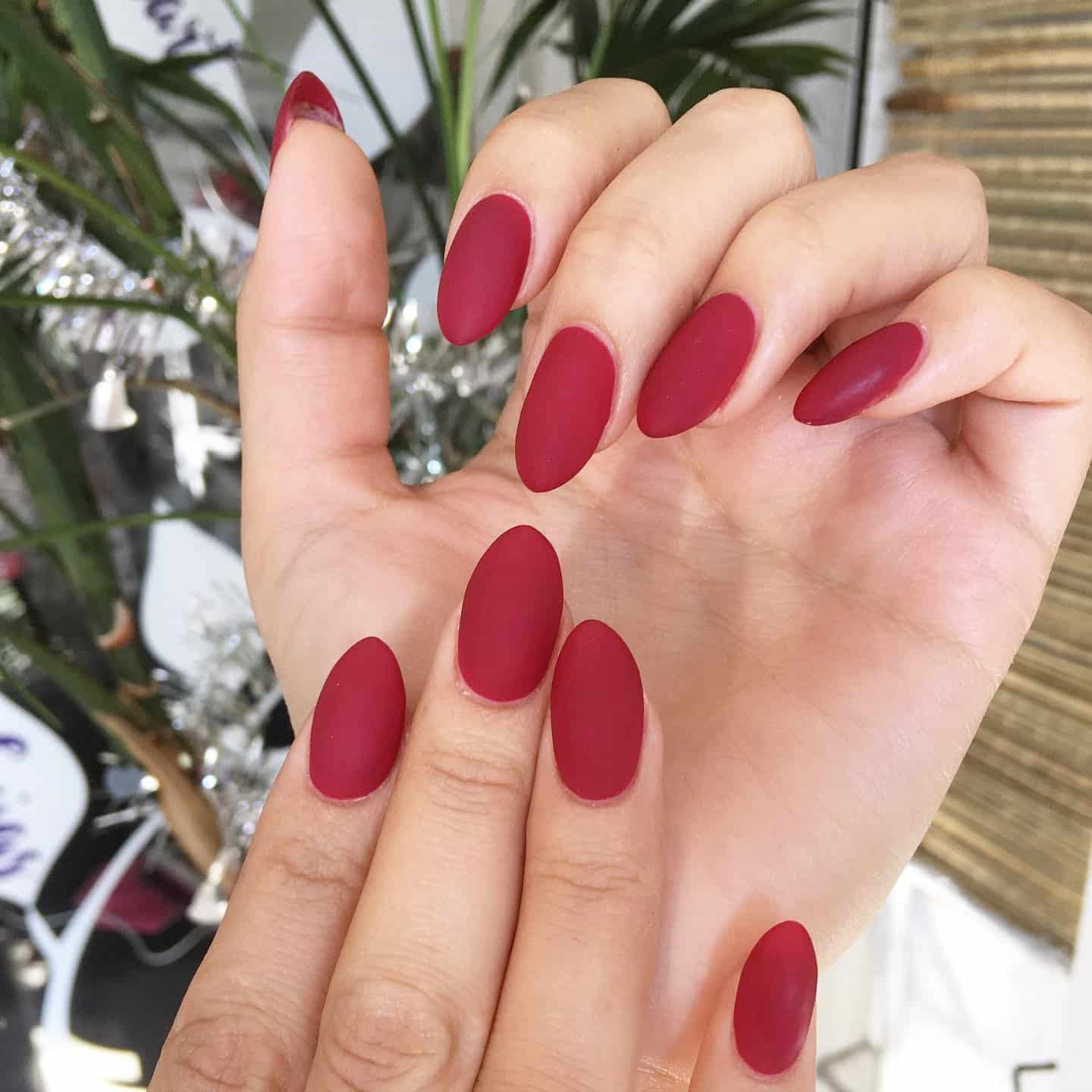 12. Matte Wine Red Almond Nails - long red nail ideas