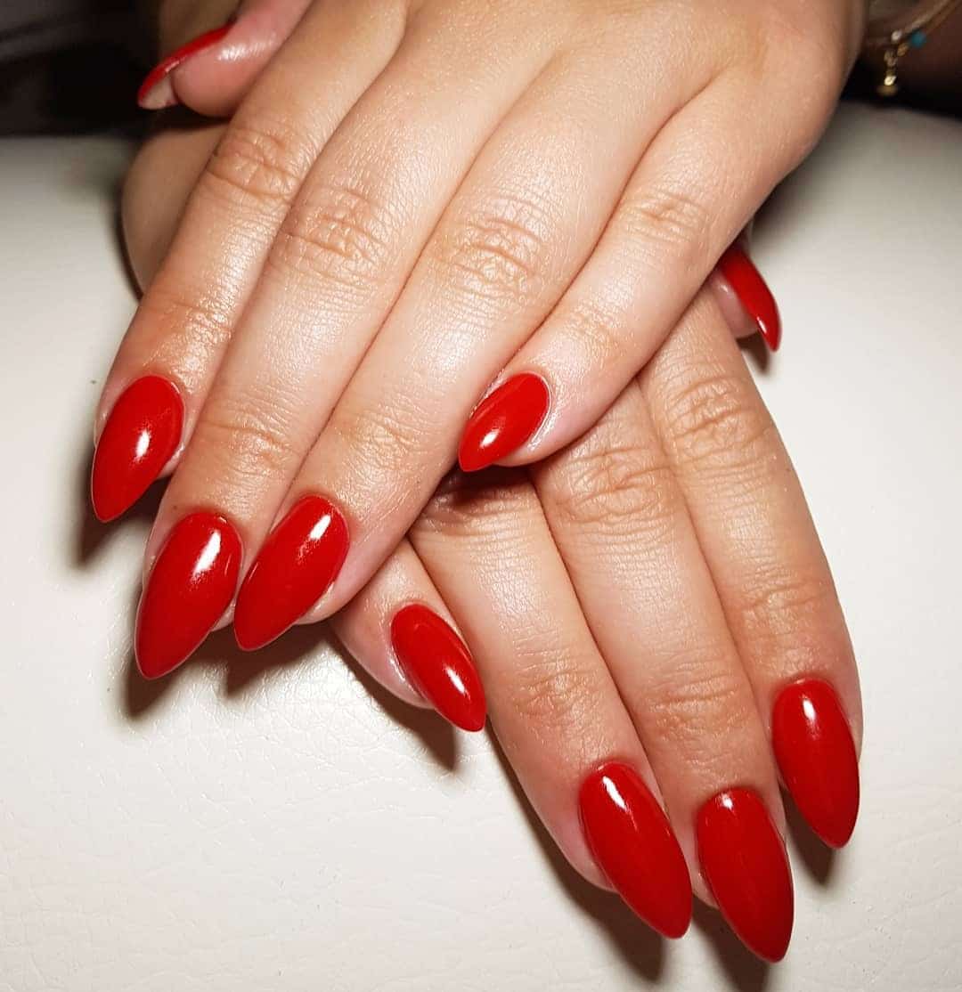13. Classic Cherry Red Almond Nails - long red nail ideas