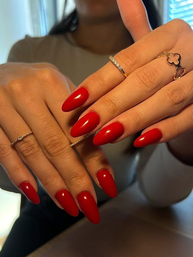 16. True Red Almond Nails with Minimal Styling - long red nail ideas