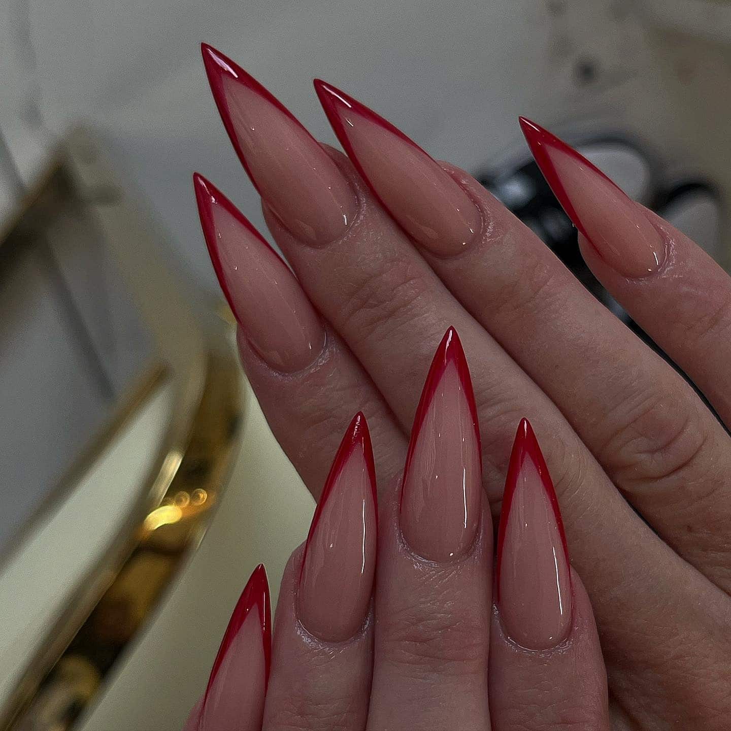 22. Red French Stiletto Nails with Sheer Base - long red nail ideas