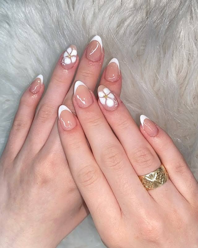 5. French Almond Nails with White Tips and Floral Details - love nail ideas
