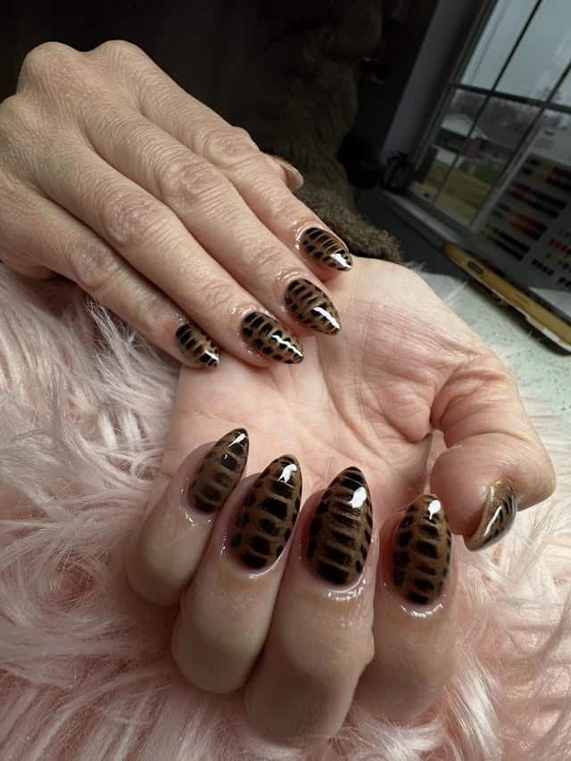 6. Leopard Print Almond Nails in Warm Brown Tones - love nail ideas