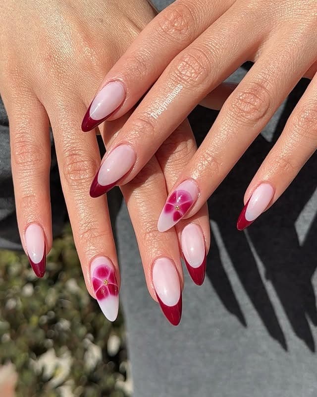 9. Deep Red French Almond Nails with Floral Accent Art - love nail ideas