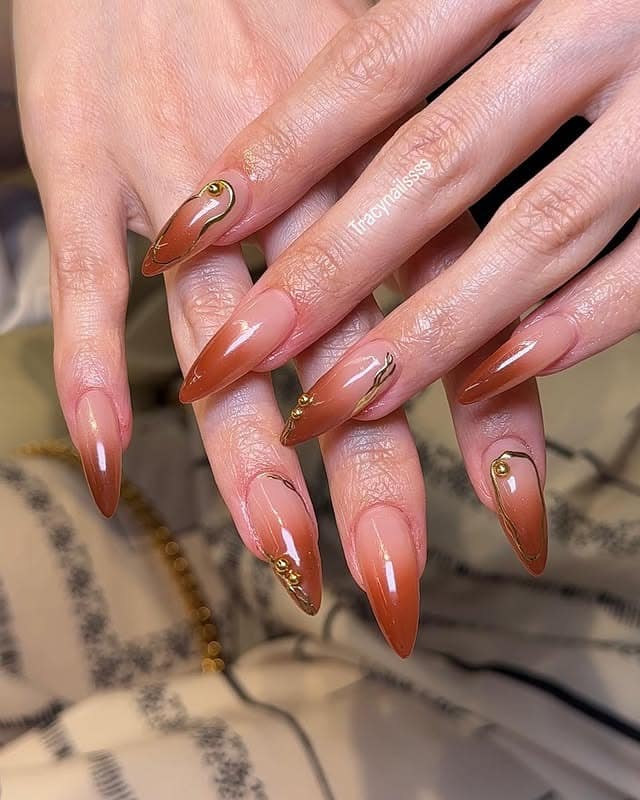 20. Mocha Almond Nails with Gold Stud and Line Accents - love nail ideas