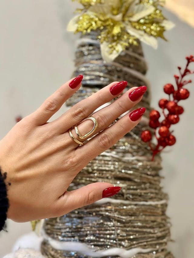 22. Classic Red Almond Nails in High-Gloss Finish - love nail ideas