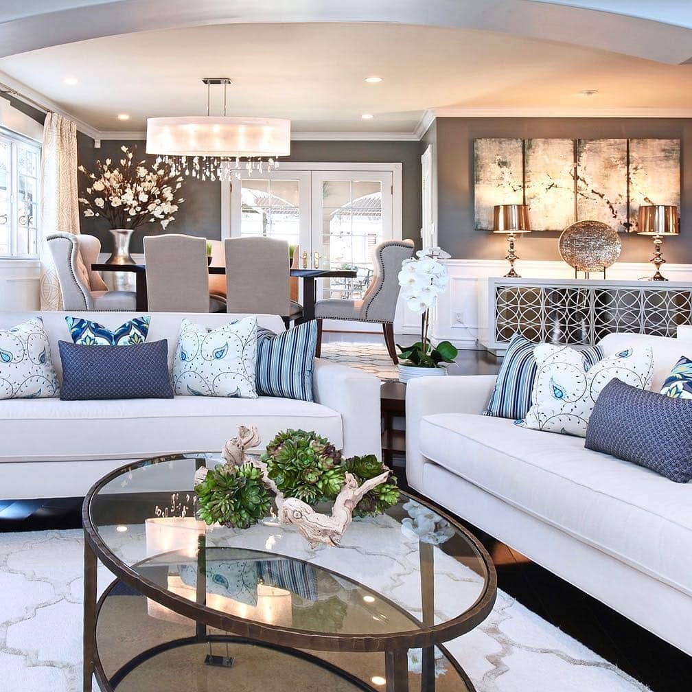 4. Open-Concept Gray and White Living Room with Warm Accents - gray and white living room ideas