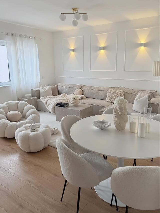 8. Soft Neutral Gray and White Living Room with Sculptural Forms - gray and white living room ideas