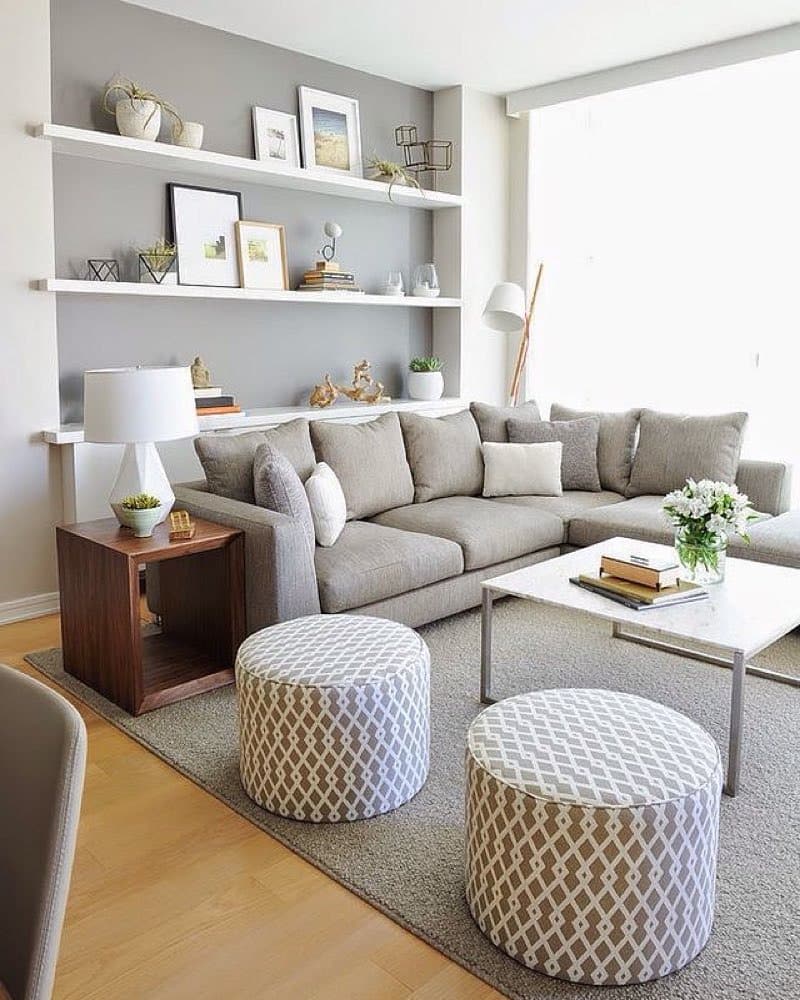 9. Casual Gray and White Living Room with Layered Shelving - gray and white living room ideas