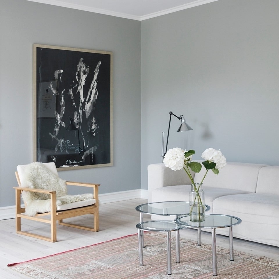 12. Soft Gray and White Scandinavian-Inspired Living Room - gray and white living room ideas