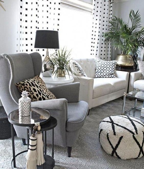 19. Patterned Gray and White Living Room with Graphic Accents - gray and white living room ideas