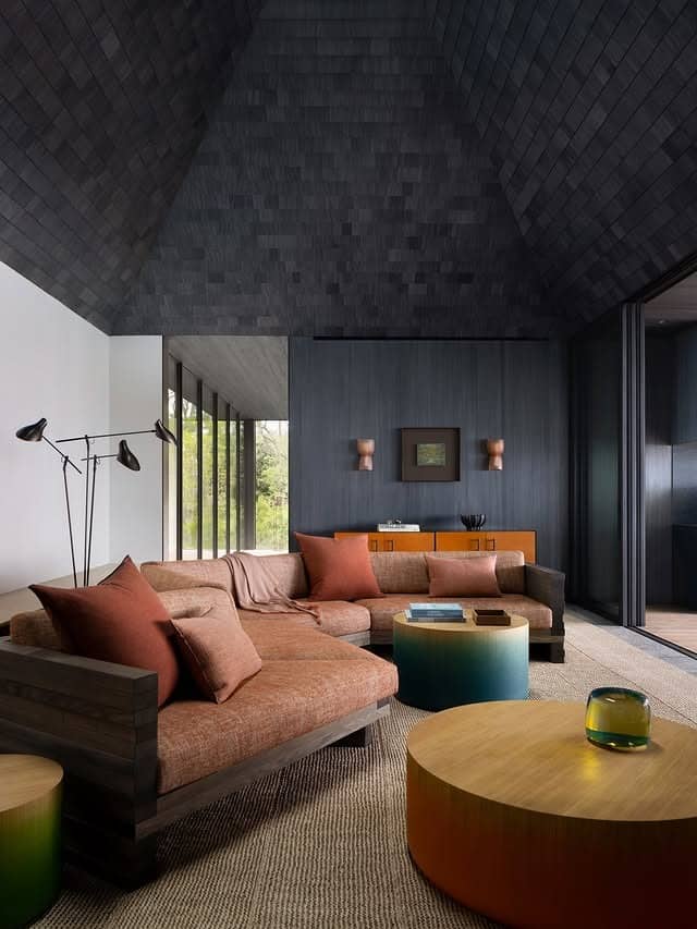 20. Contemporary Gray and White Living Room with Moody Contrast - gray and white living room ideas