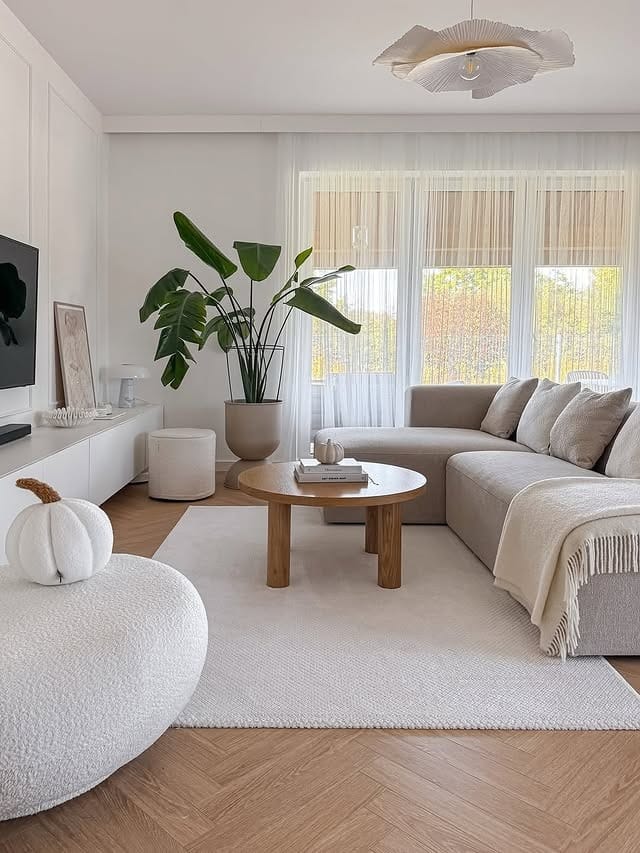 21. Soft Gray and White Living Room with Natural Wood Accents - gray and white living room ideas