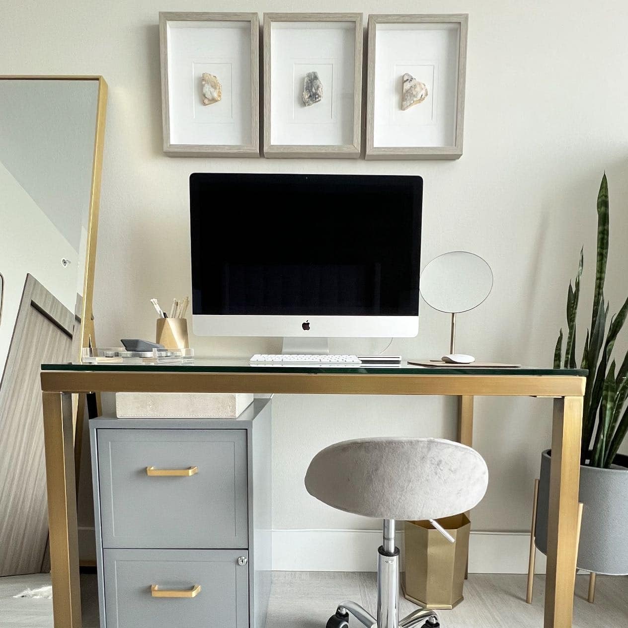 3. Neutral Modern Desk with Brass Accents - office guest room ideas