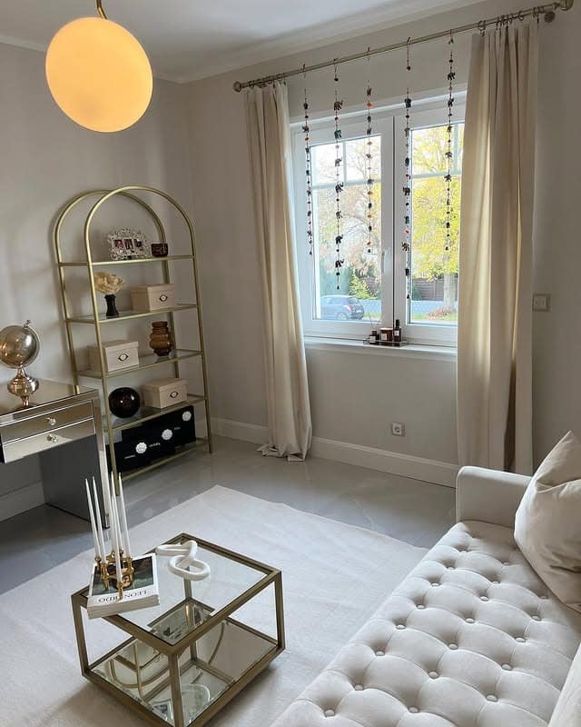 13. Warm White and Brass Office Guest Lounge - office guest room ideas